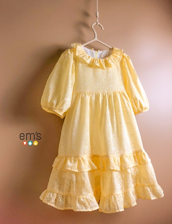 váy babydoll bé gái hoa nhí màu vàng